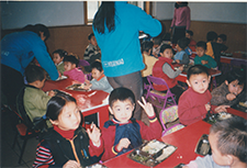 Children sharing a meal together at school
