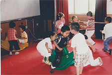 Children exploring indoor play areas